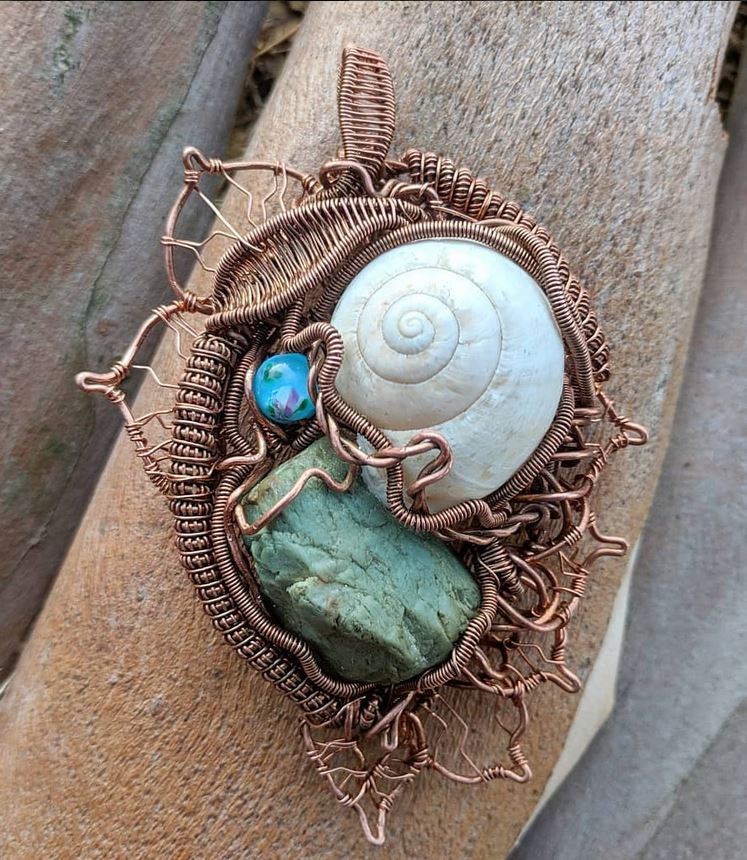 "Earth, Sea, & Sky" · Shell Amulet